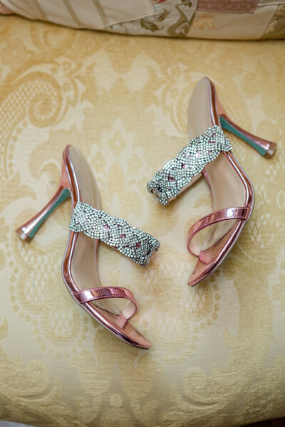 Detail wedding photo in West Jefferson, NC of a brides pink wedding shoes.