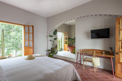 Luxury hotel room with King bed for yoga retreat guests in Oaxaca Mexico
