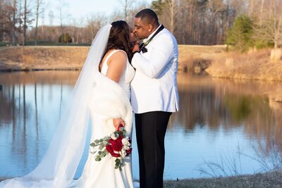 Wedding Photography in Maryland-  kissing on balcony