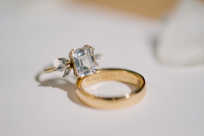 macro photo engagement ring and wedding band