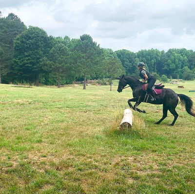 Natalie Forte riding horses and jumping a horse