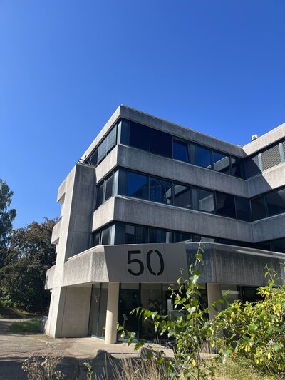 Old concrete building against blue sky.
