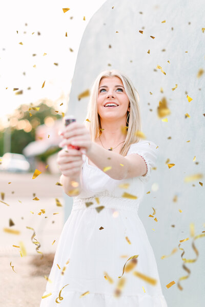 Senior girl with confetti in jackson mississippi