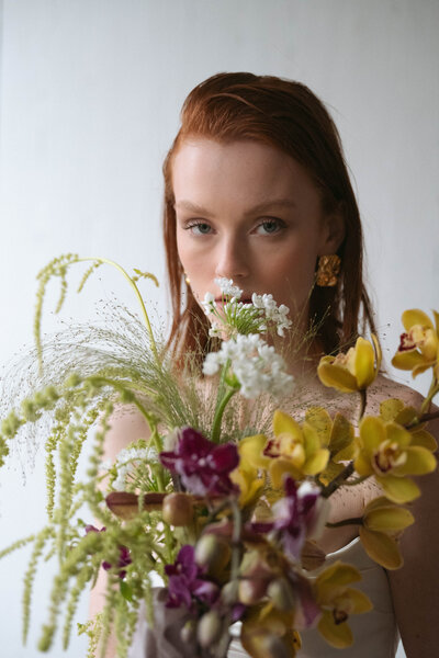 Editorial bridal shoot featuring Rook and Rose floral arrangements and a modern bridal gown, captured in Vancouver by Vintage Gem Photography.