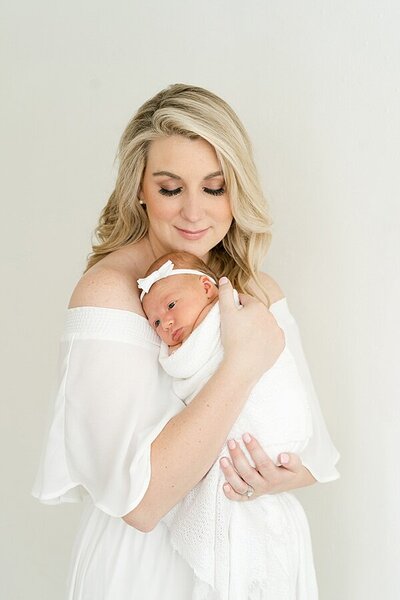 Pregnant mother wearing copper peach dress for maternity photo shoot  at Louisville Portrait Photographer Julie Brock Photography Studio