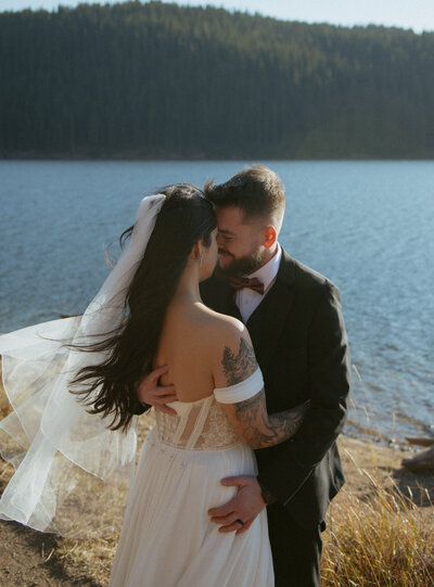 A couple eloping in Colorado near a hidden alpine lake