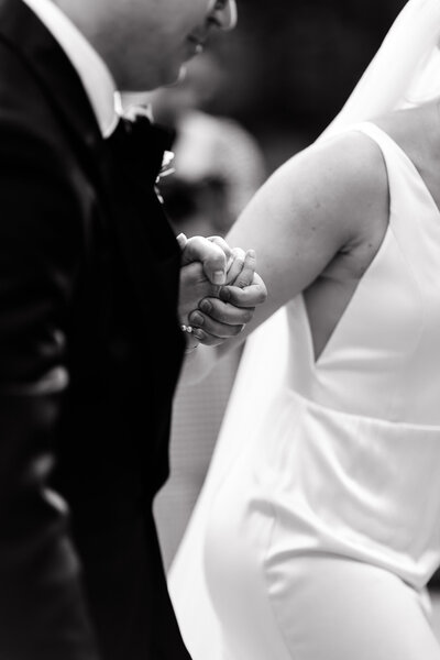 Bride and groom walk up memorial steps at their DC wedding