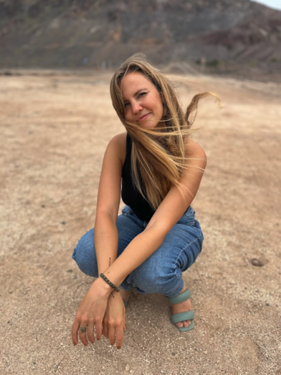 woman sitting and smiling