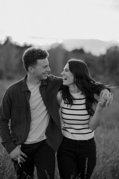 man and woman standing by wall