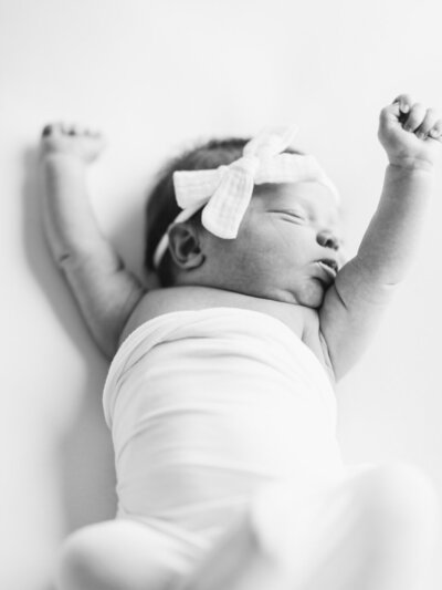 Newborn stretching photography session