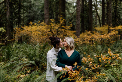 gay couple  engagement in oregon forest