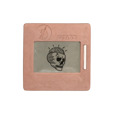 Projector slide with a skull and brain flash tattoo style drawing