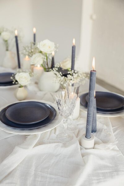 Wedding stylist setting up table