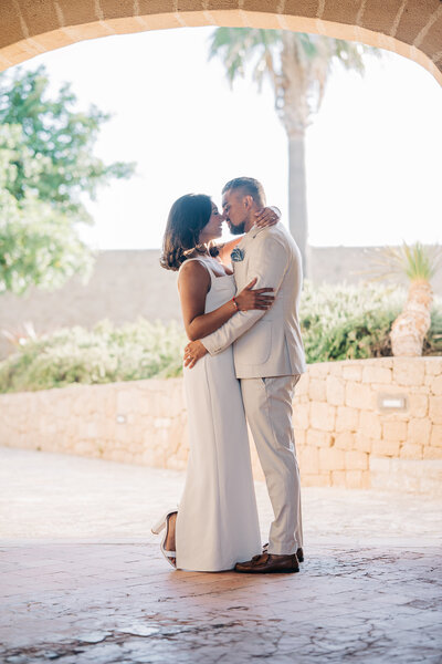 Bride and Groom affection at Luxury Wedding Planned by Maila Enea in London & Sicily