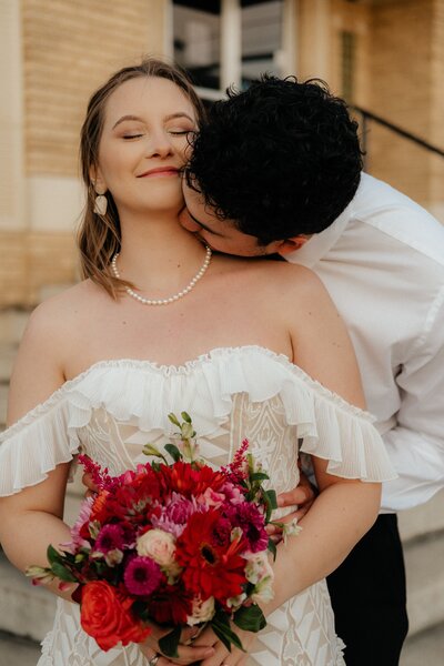 Newly married couple that eloped in the Downtown Austin courthouse. Elopement Photographer in Austin  | Photos by Meggie