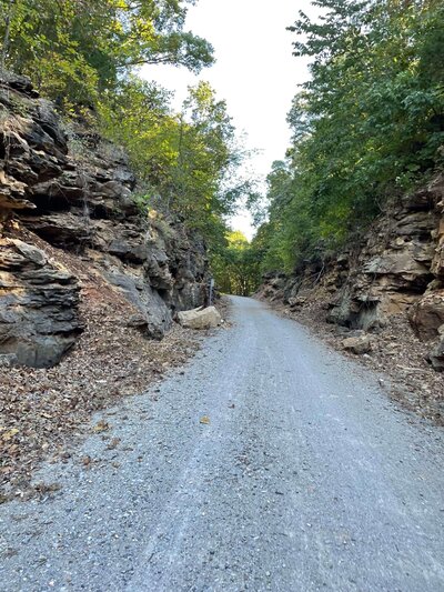 Scenic Missouri Bike Path along Katy Trail with rocks and woods