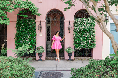senior girl at Rainbow Row in Charleston, sc