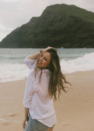 woman posing on beach