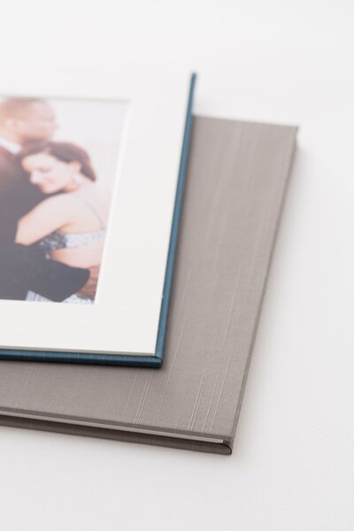 Wedding album with linen cover and opened to a layflat page