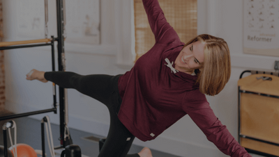woman demonstrating a modified side plank