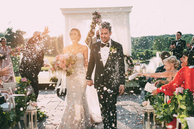 Madison and husband wedding day confetti toss