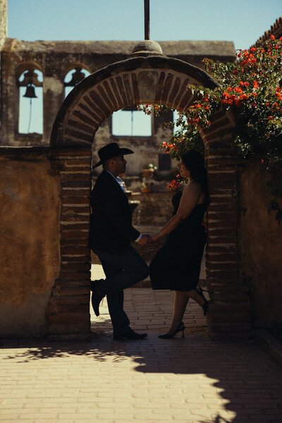 Cynthia and Alex had their engagement photoshoot at Mission San Juan Capistrano; captured by Thuy Tran Photos