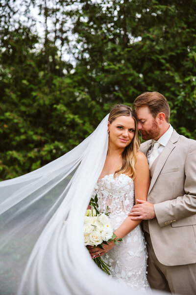 Wedding couple with white flower bouquet - Perham, Minnesota