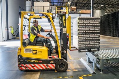 Forklift moving goods in Australian Warehouse
