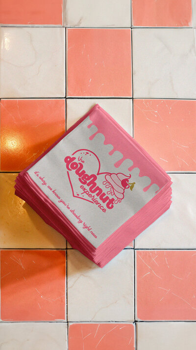 The Doughnut Experience gourmet bakery branding, logo, and packaging design by Wildspark Creative. Feminine and boutique-inspired, the Michigan-based brand identity elevates doughnuts, retail appeal, and female founder visibility in the CPG space.

Michigan female founder bakery branding for The Doughnut Experience. Wildspark Creative designed custom packaging, logo, and brand identity to capture the essence of gourmet doughnuts, boutique style, and a cohesive, professional CPG presence.