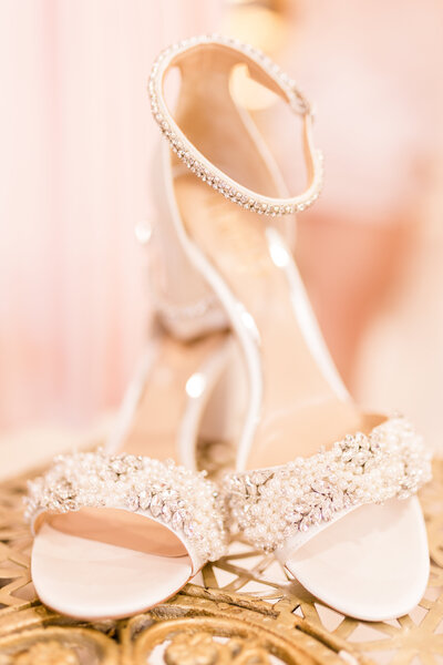 Bride's shoes with pretty pink background