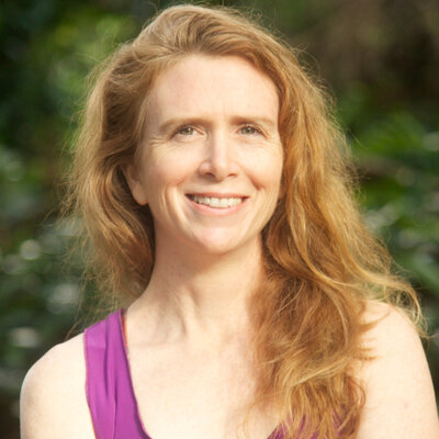 Professional headshot of Soma Yoga Institute's director.