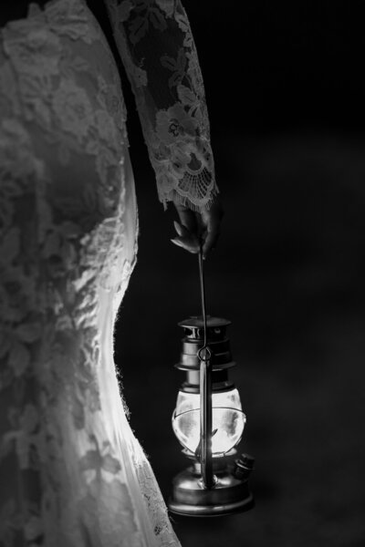 detail image of white roses and white wedding shoes