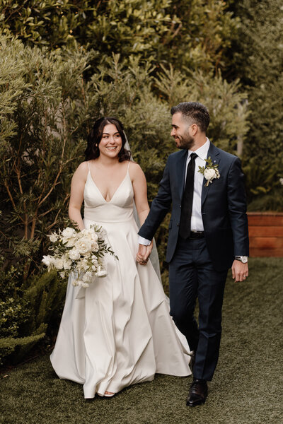 bride and groom walking down aisle in san francisco