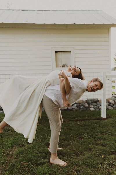 bride and groom holding hands