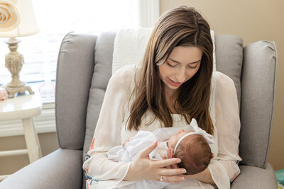 Ramsey holding her baby girl