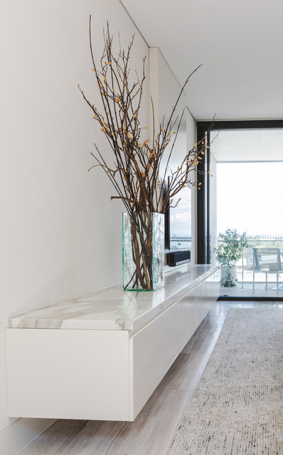 Amanda Wyeth Design| Calacatta Oro Marble Floating Entertainment Cabinet| Battery Acid Glass Vase