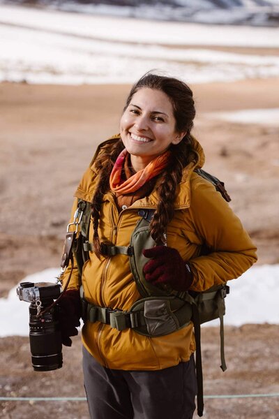 Headshot of photographer smiling.