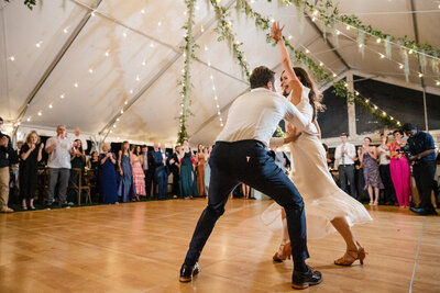 bride and groom joyful first dance at reception