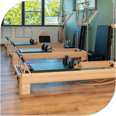 Set of three reformers with towers at Milwaukie Pilates