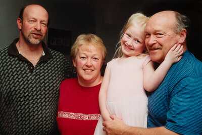 young blonde girl with her father