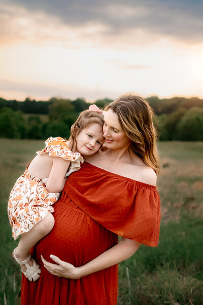 joyful moment captured between mom and her sons captured by Mila K Photography in Maryland