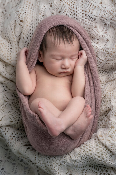 Cozy newborn photo taken in Lynnwood, WA during studio session.