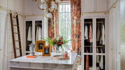 a dining room with a black, white, and neutral color scheme