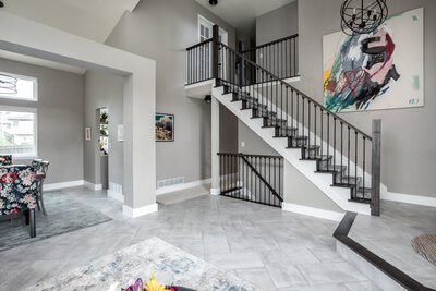 staircase and great room design by Colorado interior designer Alison Reuter of A/Revelation designs