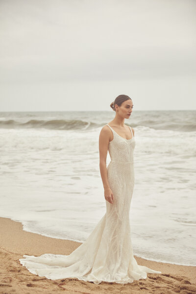 black and white image bride wearing  long sleeve lace wedding dress