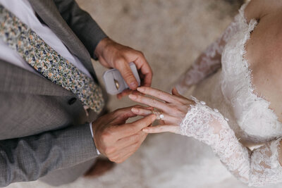 bride and groom rings detail intimate ceremony at borgo santo pietro 