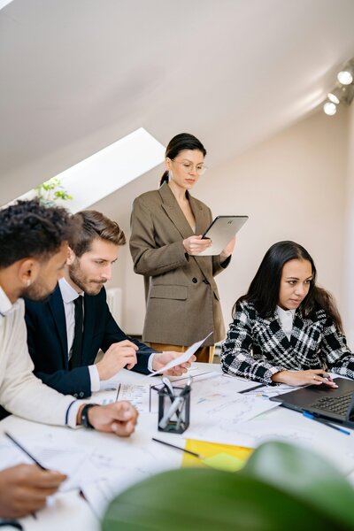 Group of people in office having team meeting