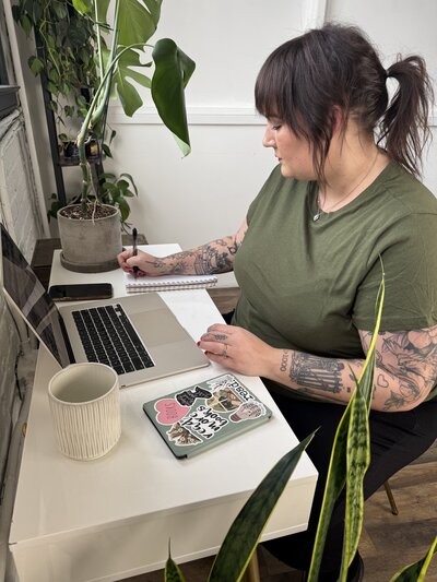 AQ Design Studio founder working on custom brand strategy