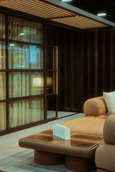 outdoor seating area with coffee table and light reflecting off window