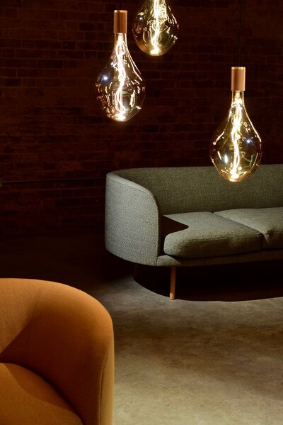 three-edison-light-bulbs-beside-the-sofa-945688